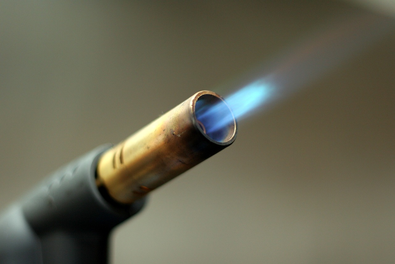 Blow torch with a blue flame.