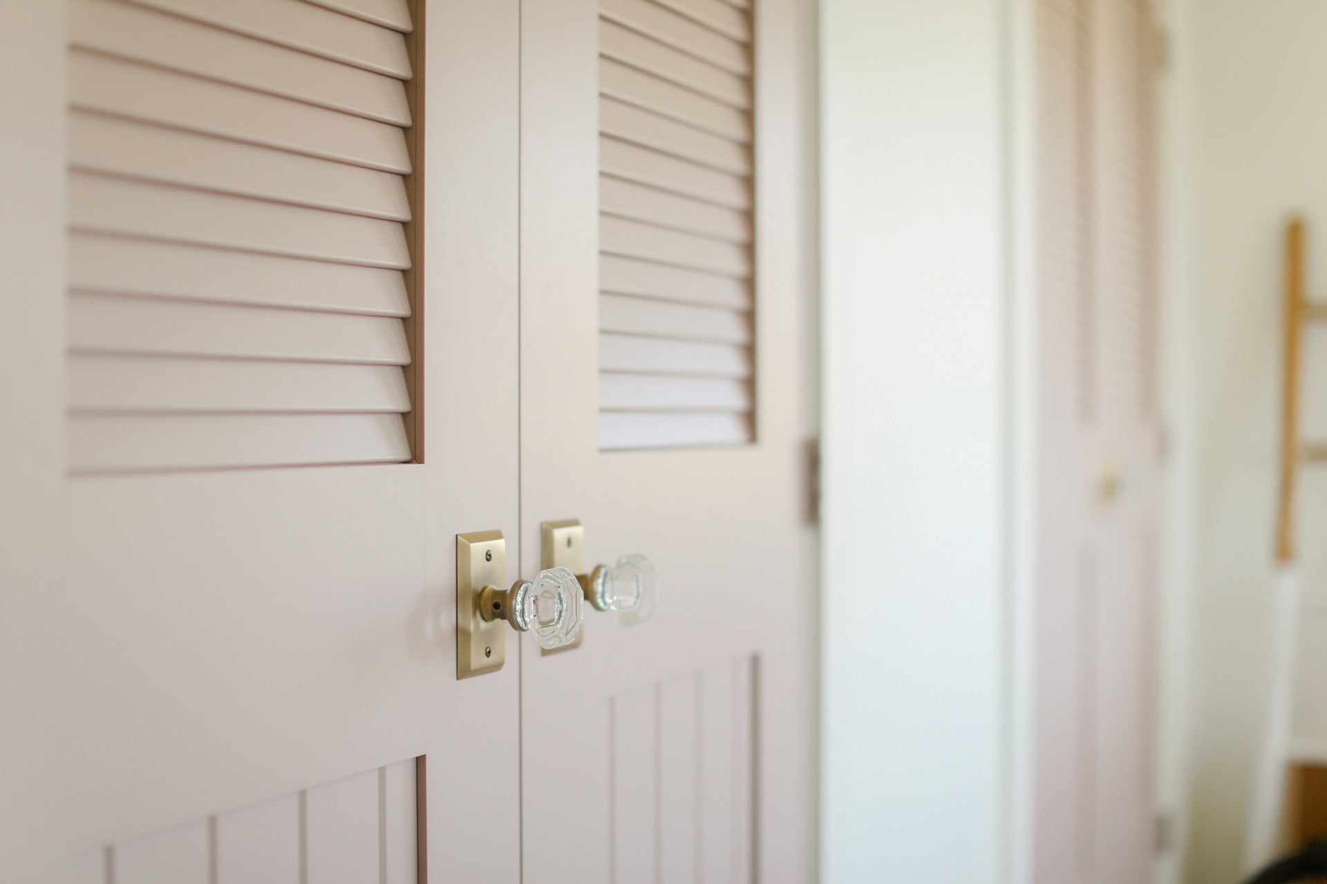 nina williams closet doors studio brass door hardware crystal knobs pink doors