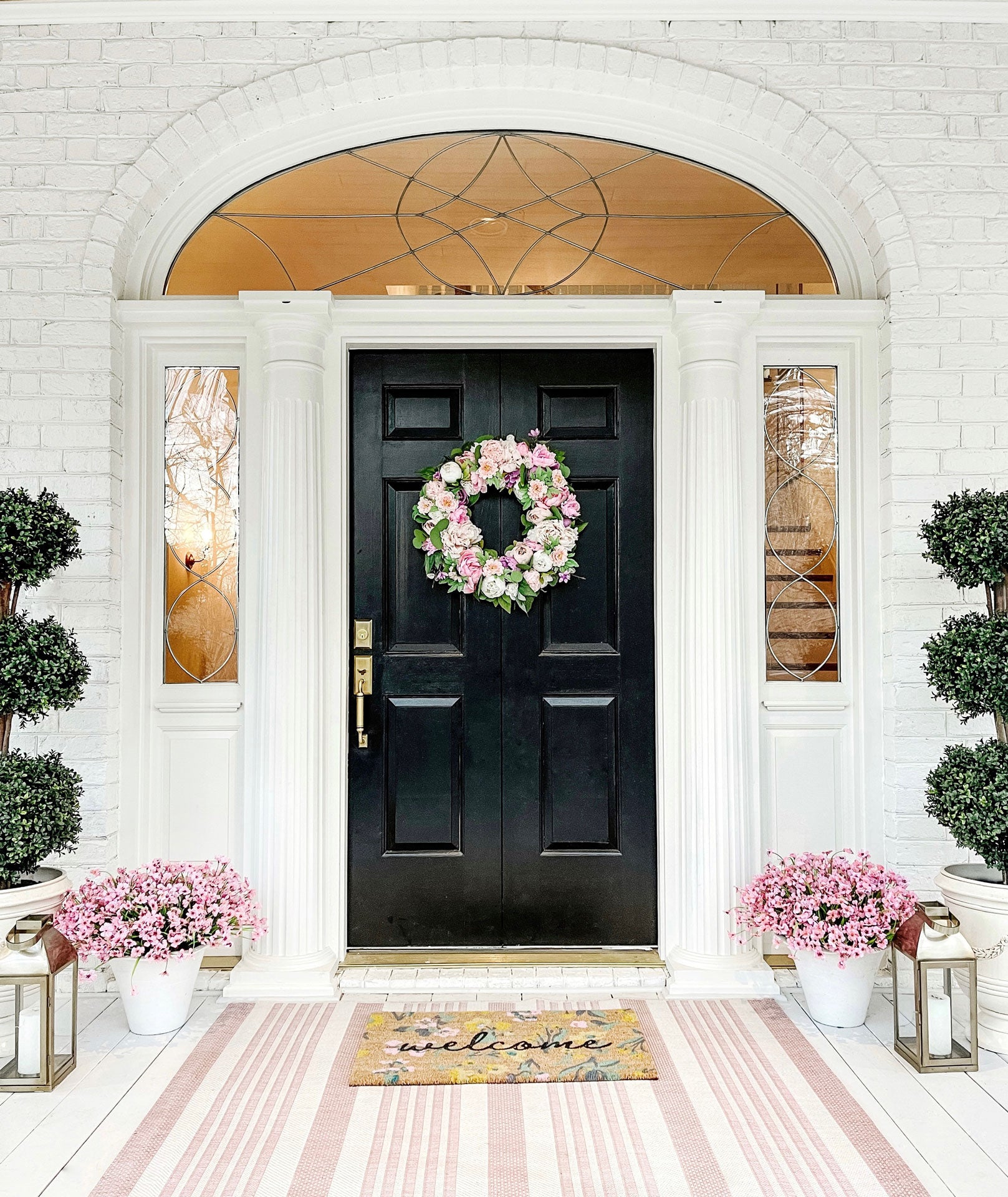 black front door with brass hardware