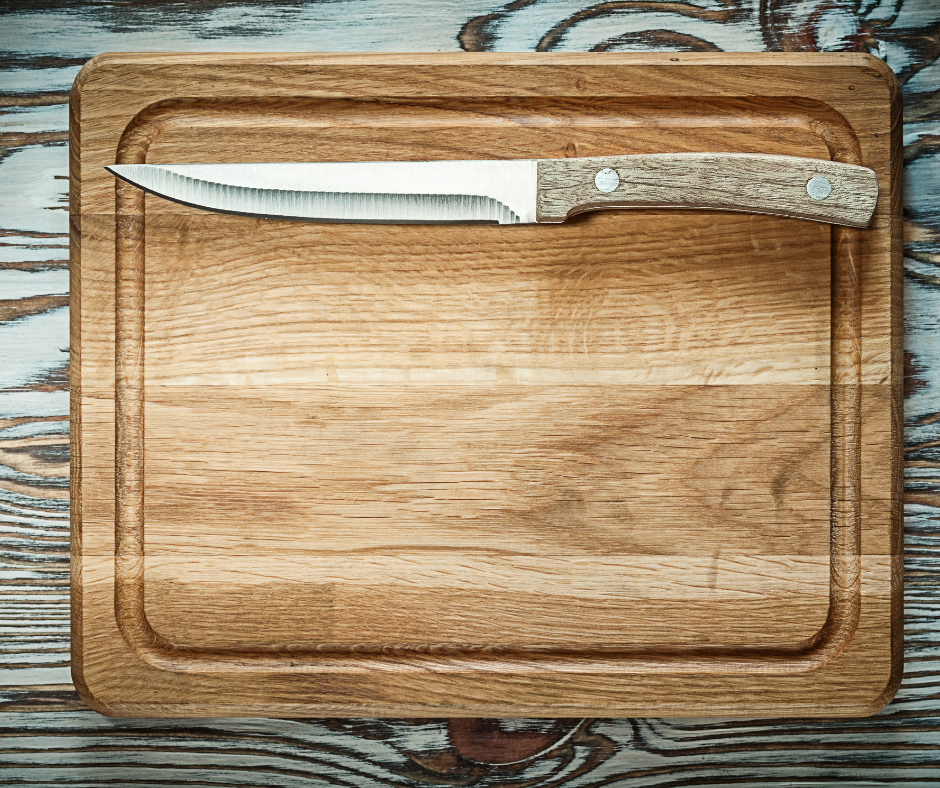 Wooden Carving Board on a Table