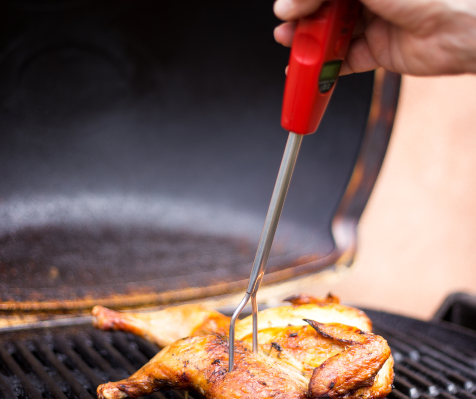 Meat Thermometer in Chicken on a Grill